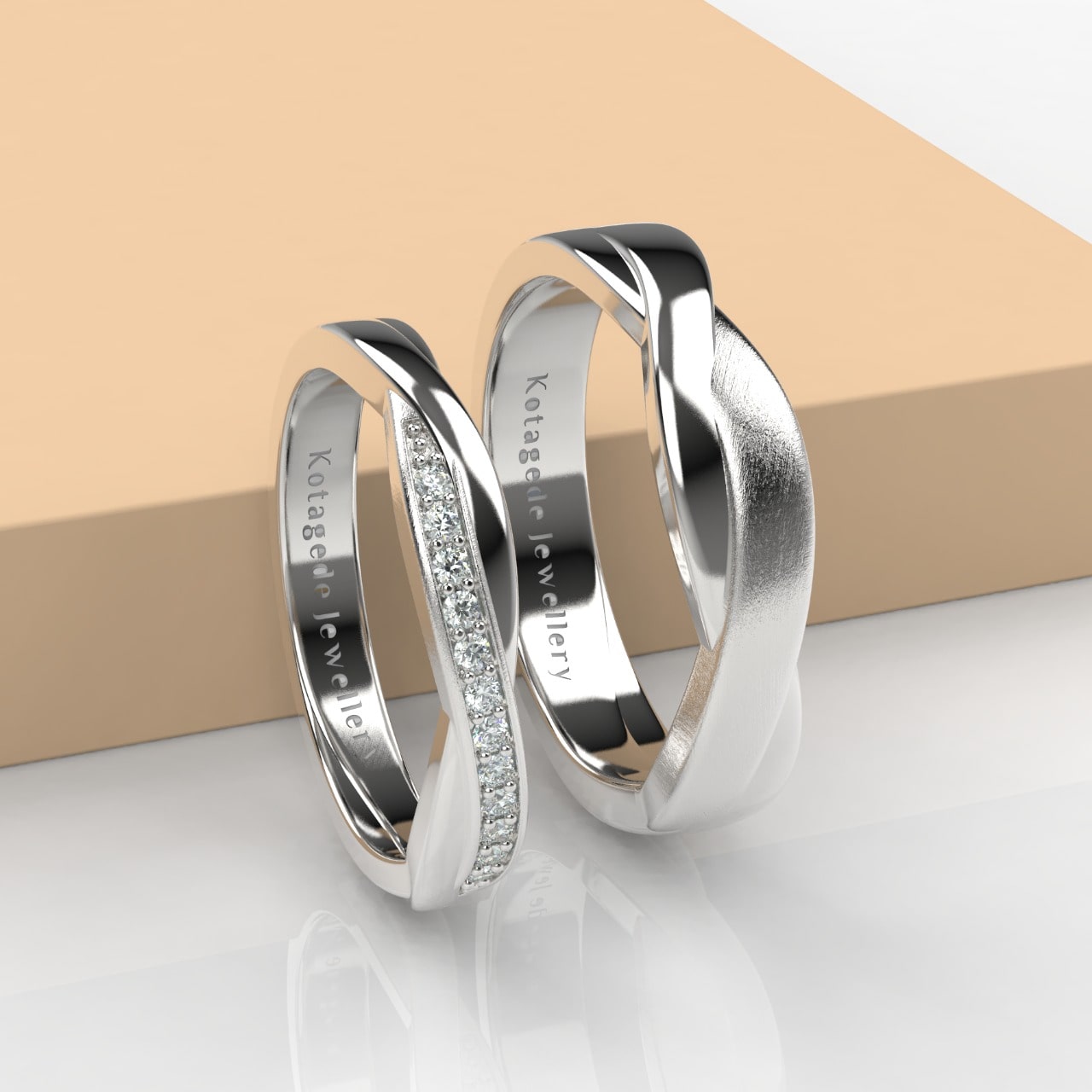 Cincin Kawin Tunangan Simple Criss-Cross Platidium Doff.jpeg